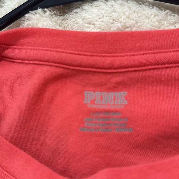 Women’s size large coral in color t-shirt. - Picture 3 of 3
